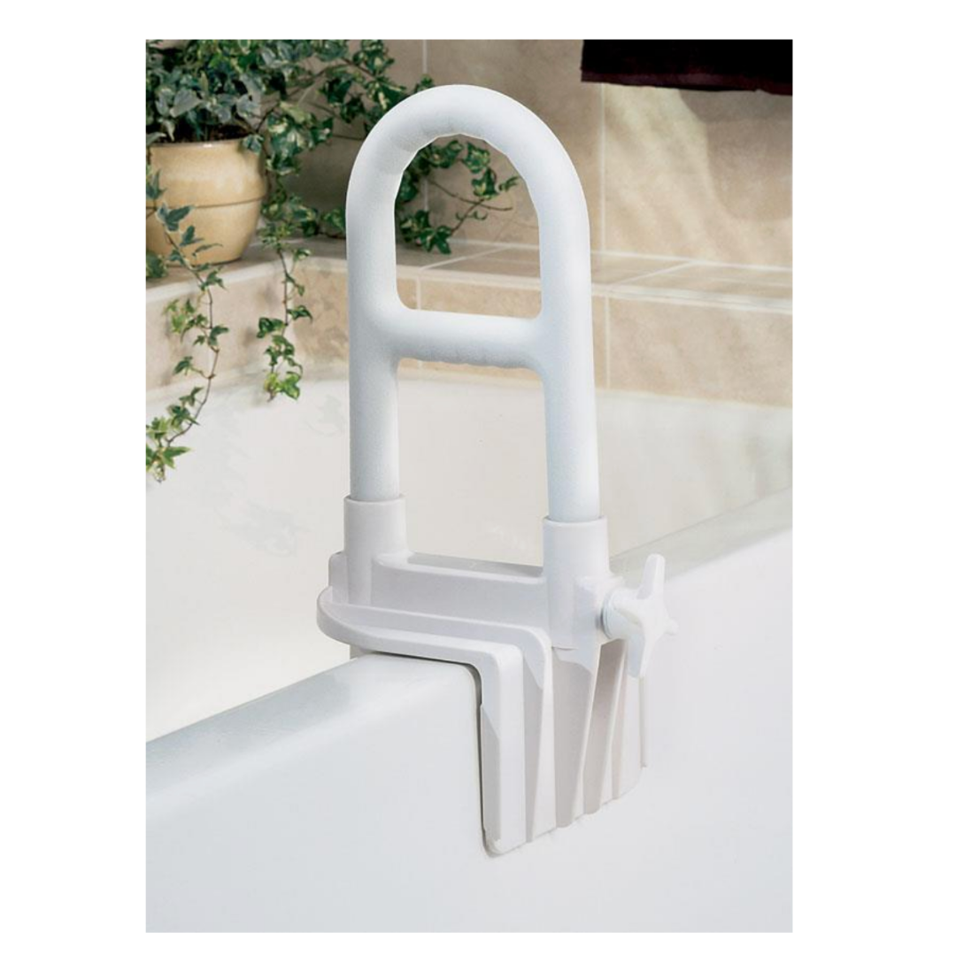 The Medline Bilevel Clamp-On Bathtub Grab Bar, featuring a step-through clamp design, is securely attached to the bathtub’s side for safe entry and exit; a potted plant is visible in the background.